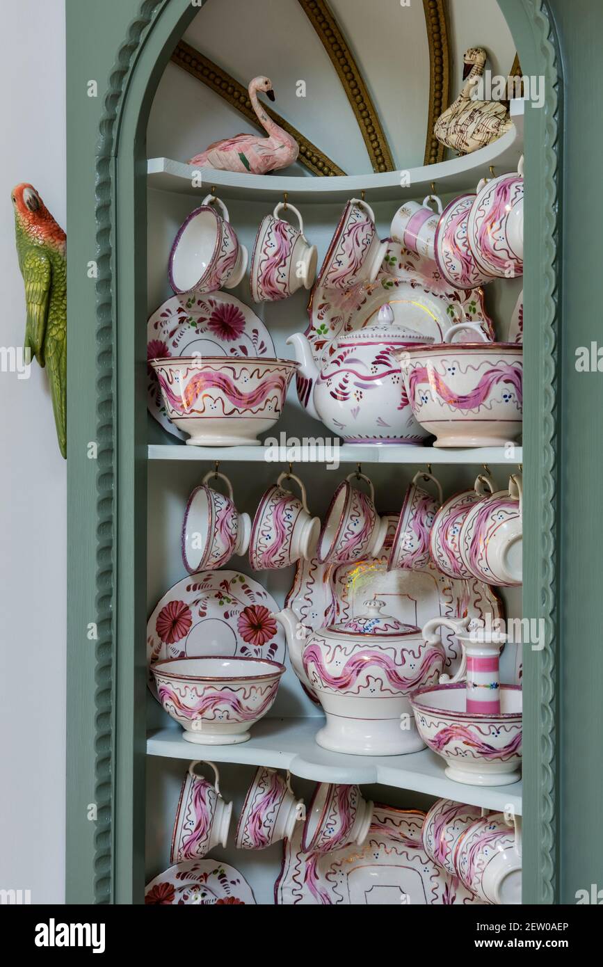 Collection of vintage chinaware and porcelain in cabinet, Dorset. Stock Photo