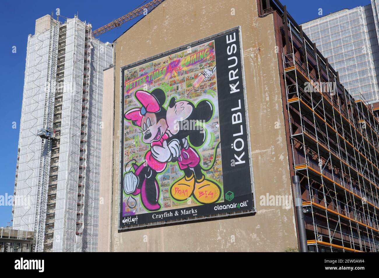 Eat, Deutschland. 02nd Mar, 2021. Graffiti art, art, creative, 02.03.2021,  Essen, Germany, art, graffiti, by the artist Dennis Klapschus on a house  wall, Corona, Street Art, Mickey Mouse Disney, syringe, vaccination,  Copyright