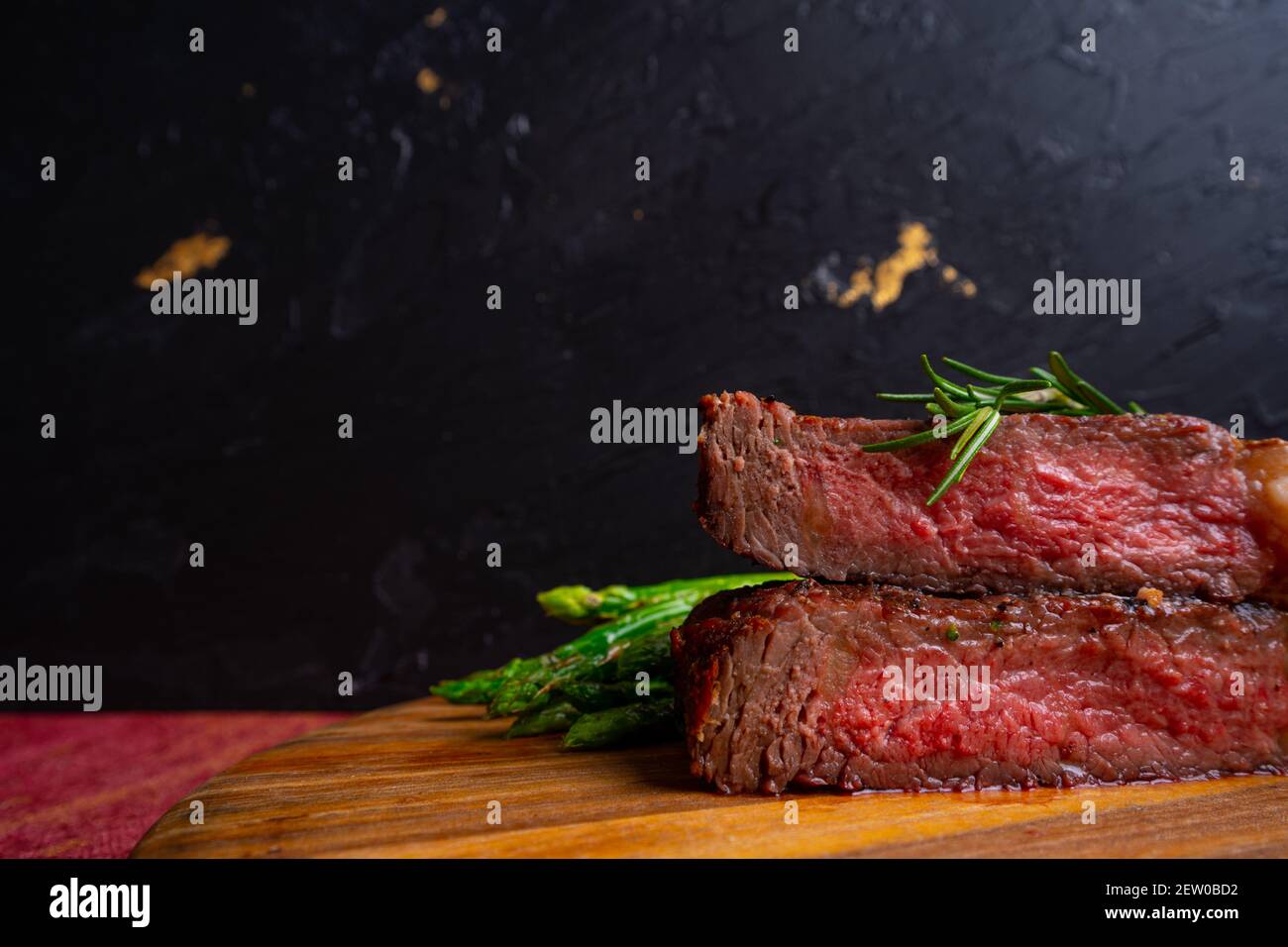grilled venison fillet on wooden table close up Stock Photo