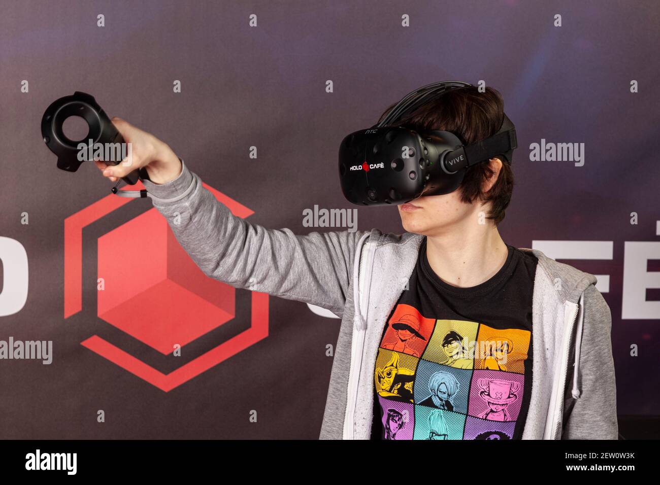 Immerse yourself in the world of virtual reality, player with video glasses in 3D Stock Photo