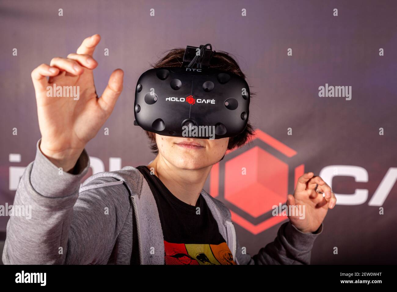 Immerse yourself in the world of virtual reality, player with video glasses in 3D Stock Photo