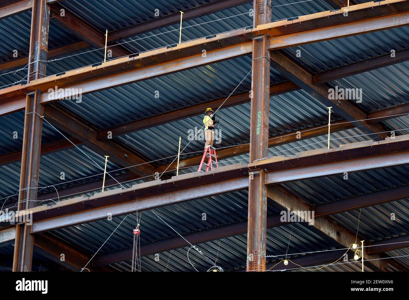 Steel beam girders worker construction site, Boston, Massachusetts Stock Photo