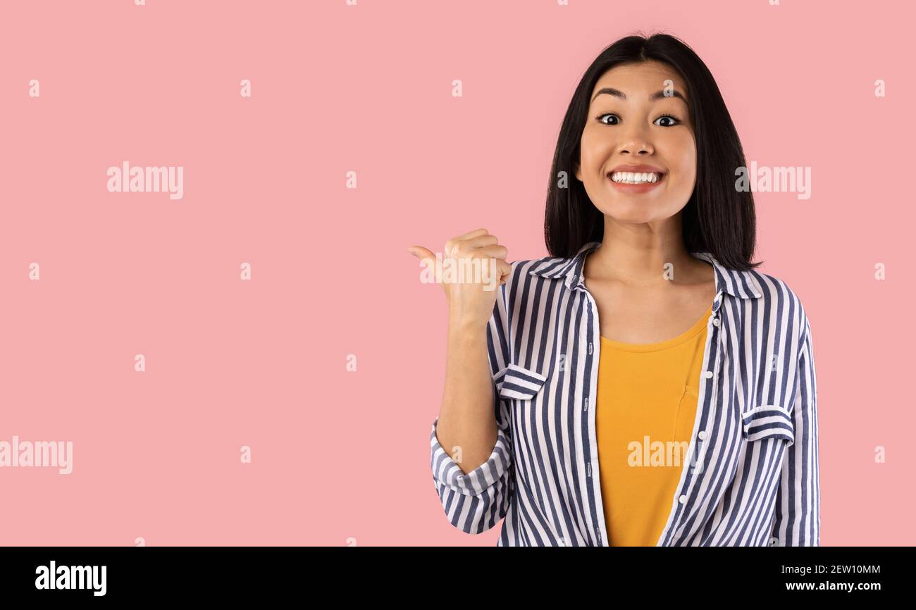 Woman showing pointing hi-res stock photography and images - Alamy