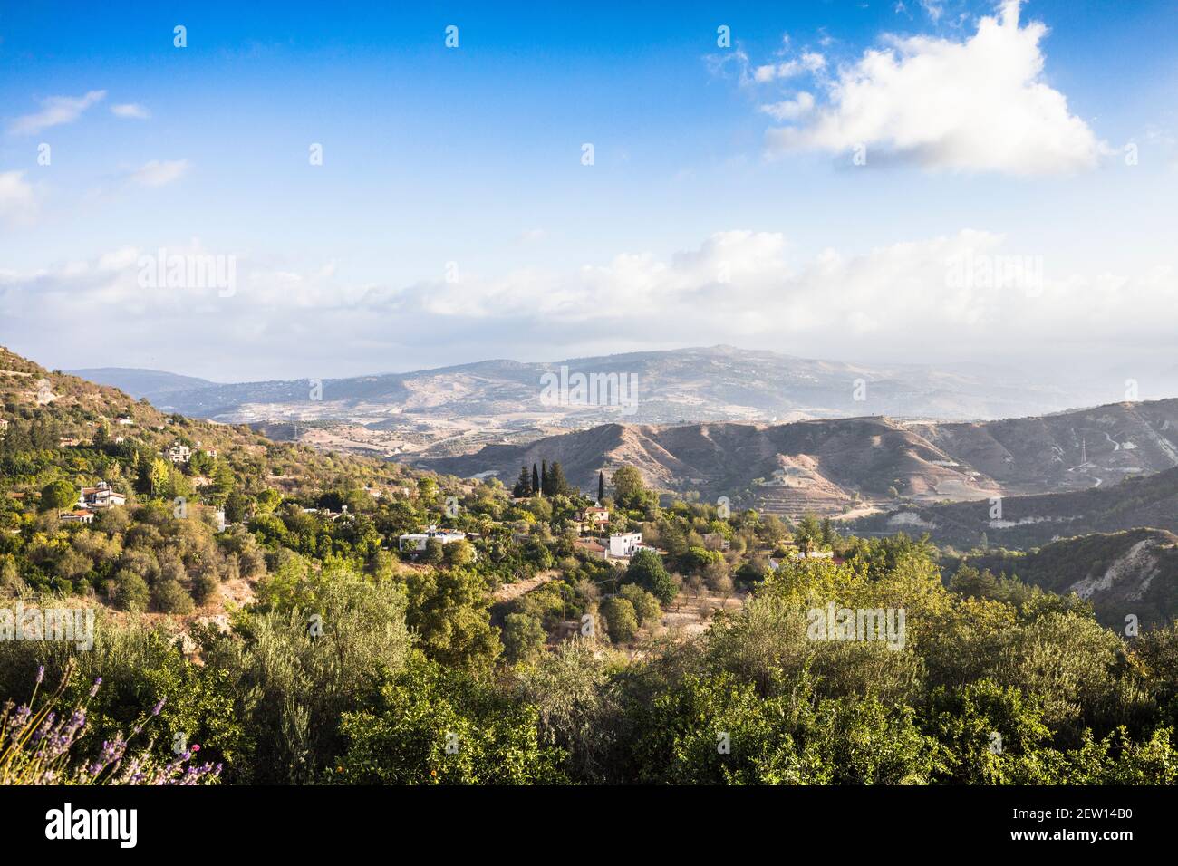 View from a little hillside village in Cyprus, overlooking hills and the Troodos mountains Stock Photo