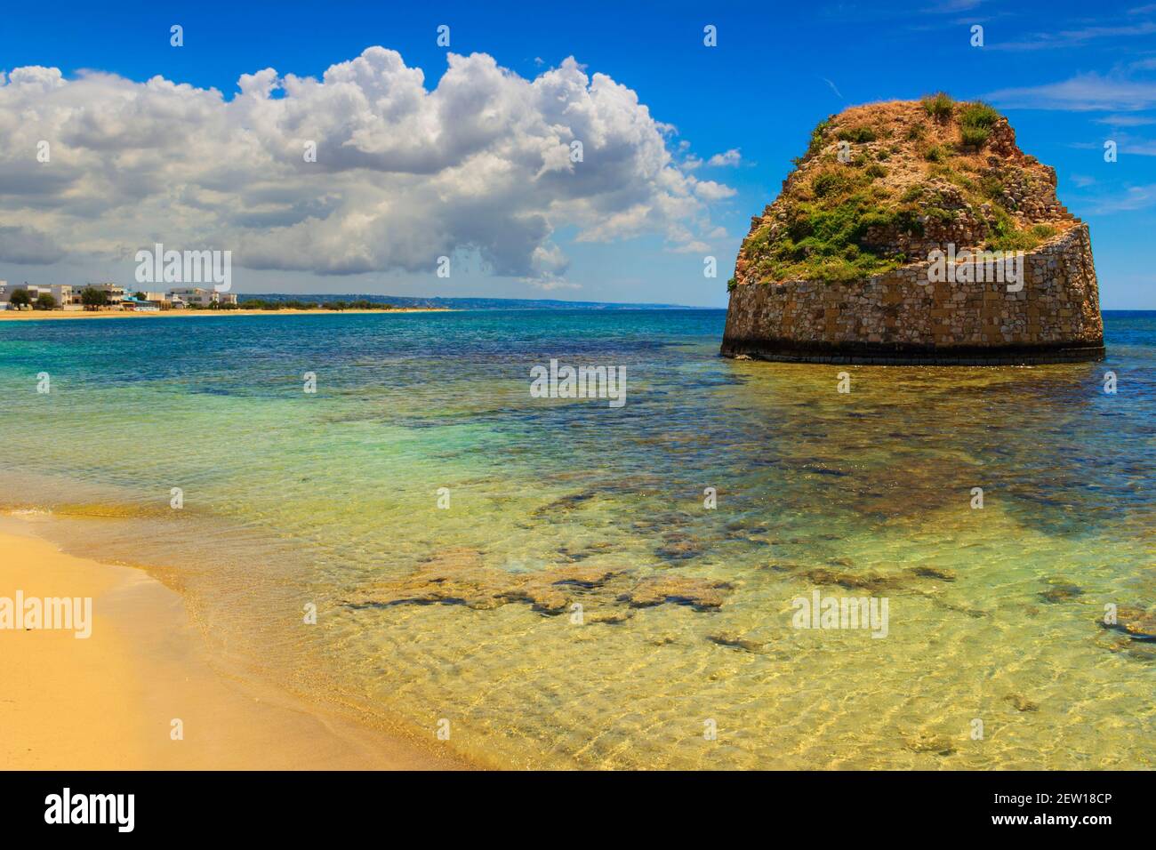 Salento coast: Torre Pali beach (Lecce). ITALY (Apulia).The low sandy coastline is characterized by dunes covered with Mediterranean scrub. Stock Photo