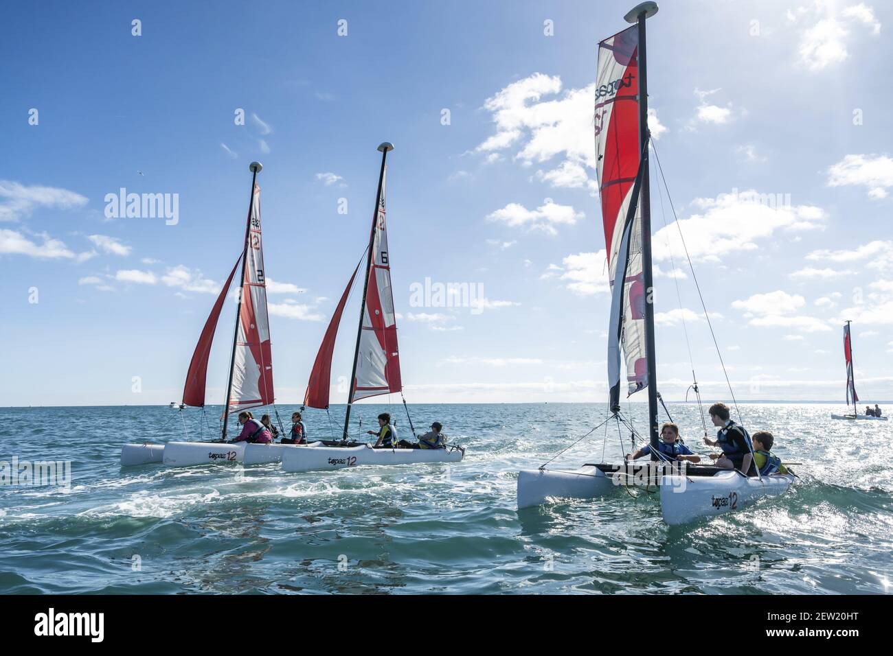 France, Côtes d'Armor, Saint-Quay-Portrieuc, Saint-Quay sailing school catamaran in action Stock Photo