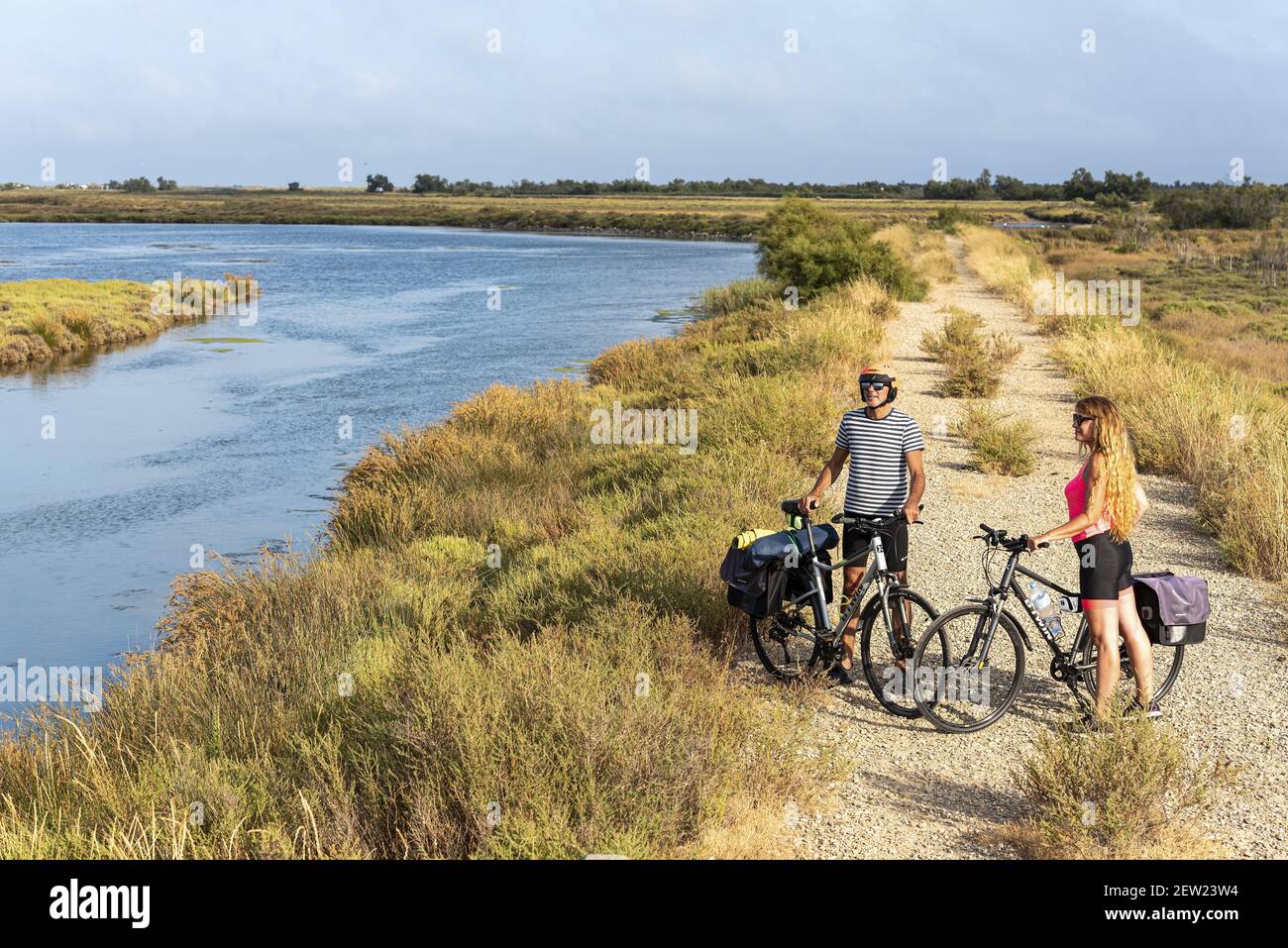 France Bouches Du Rhone 13 Viarhona Port Saint Louis Couple Of Cyclists Near The Cabanes De Carteau Stock Photo Alamy France Bouches Du Rhone 13 Viarhona Port Saint Louis Couple Of Cyclists Near The Cabanes De Carteau Stock Photo Alamy