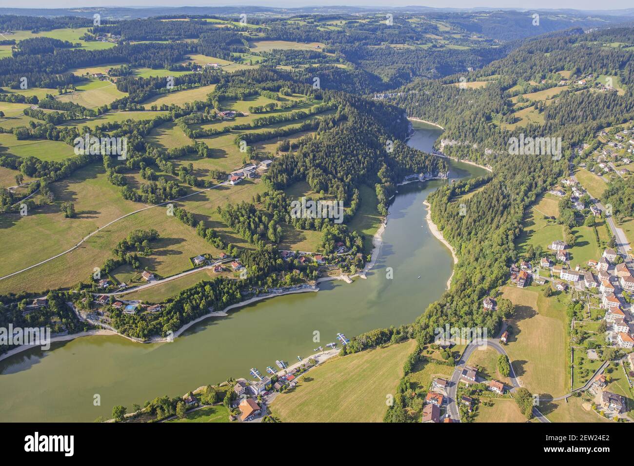 France, Doubs, Villers le Lac, Bassins and Saut du Doubs, Chaillexon lake, boat, cliffs (aerial view) Stock Photo