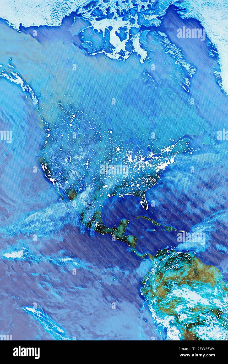 Planet Earth viewed from a satellite in space with nighttime light pollution Stock Photo