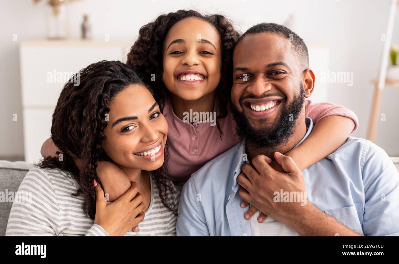 Portrait of a happy black family smiling at home Stock Photo - Alamy