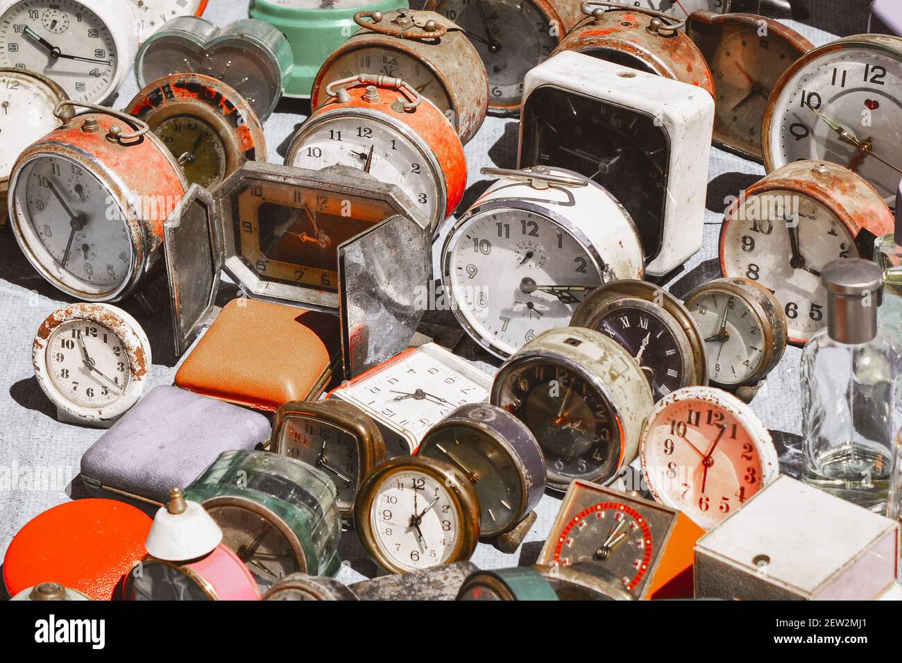 Many vintage clocks at a flea market Stock Photo Alamy