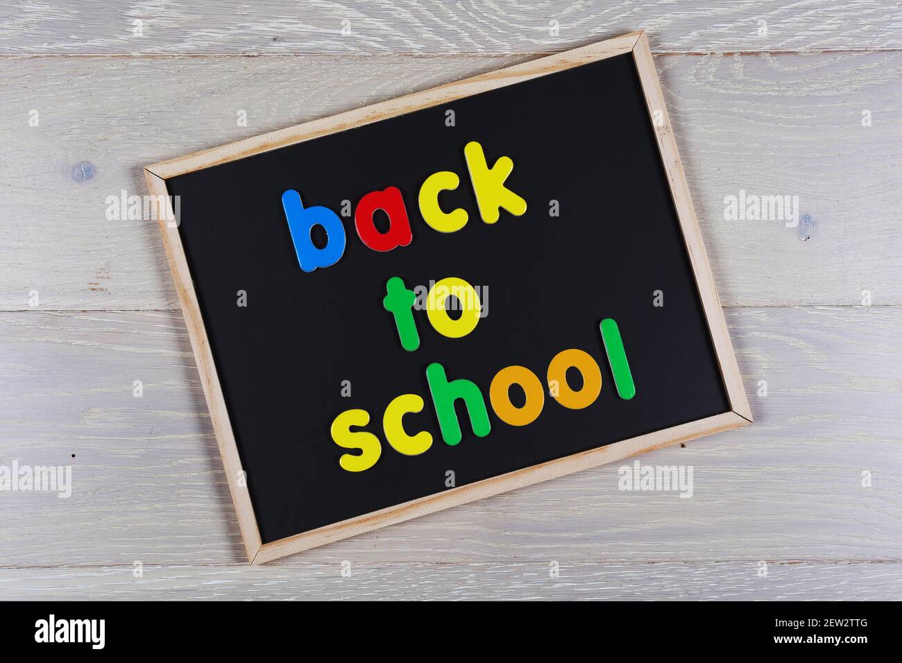 Back to school concept: letters on a chalkboard Stock Photo