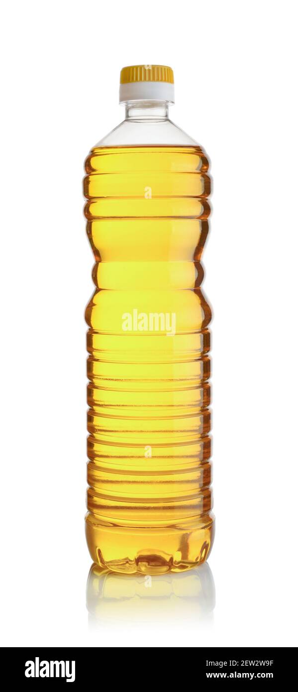 Vegetable oil in plastic bottle isolated on white background. Stock Photo