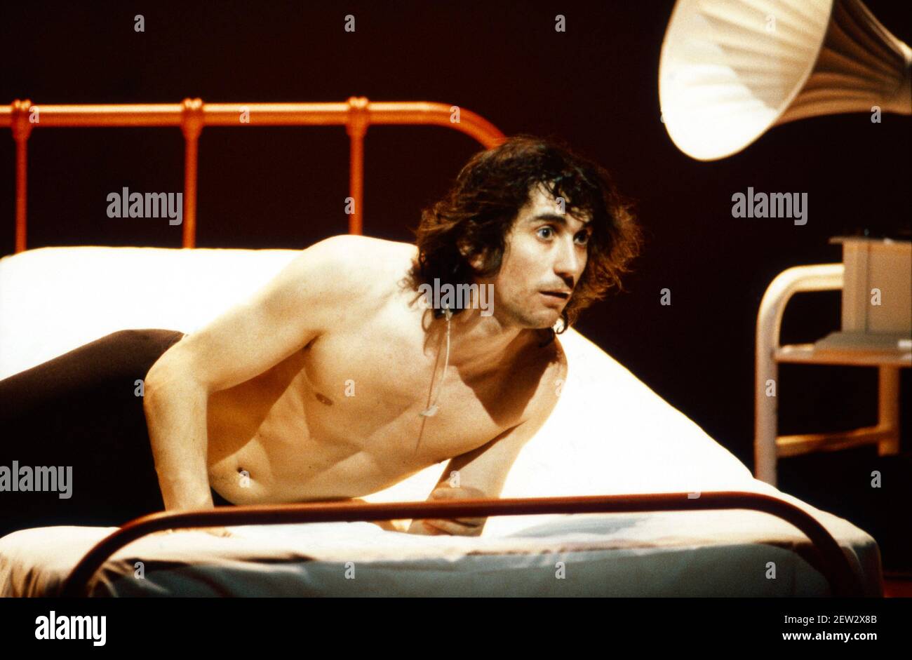 Phil Daniels (Alex) in A CLOCKWORK ORANGE 2004 at the Barbican Theatre, London EC2  06/02/1990  a Royal Shakespeare Company production  written by Anthony Burgess in collaboration with Ron Daniels  music by The Edge & Bono  design: Richard Hudson  lighting: David Hersey  choreography: Arlene Phillips  fights: Malcolm Ranson  director: Ron Daniels Stock Photo