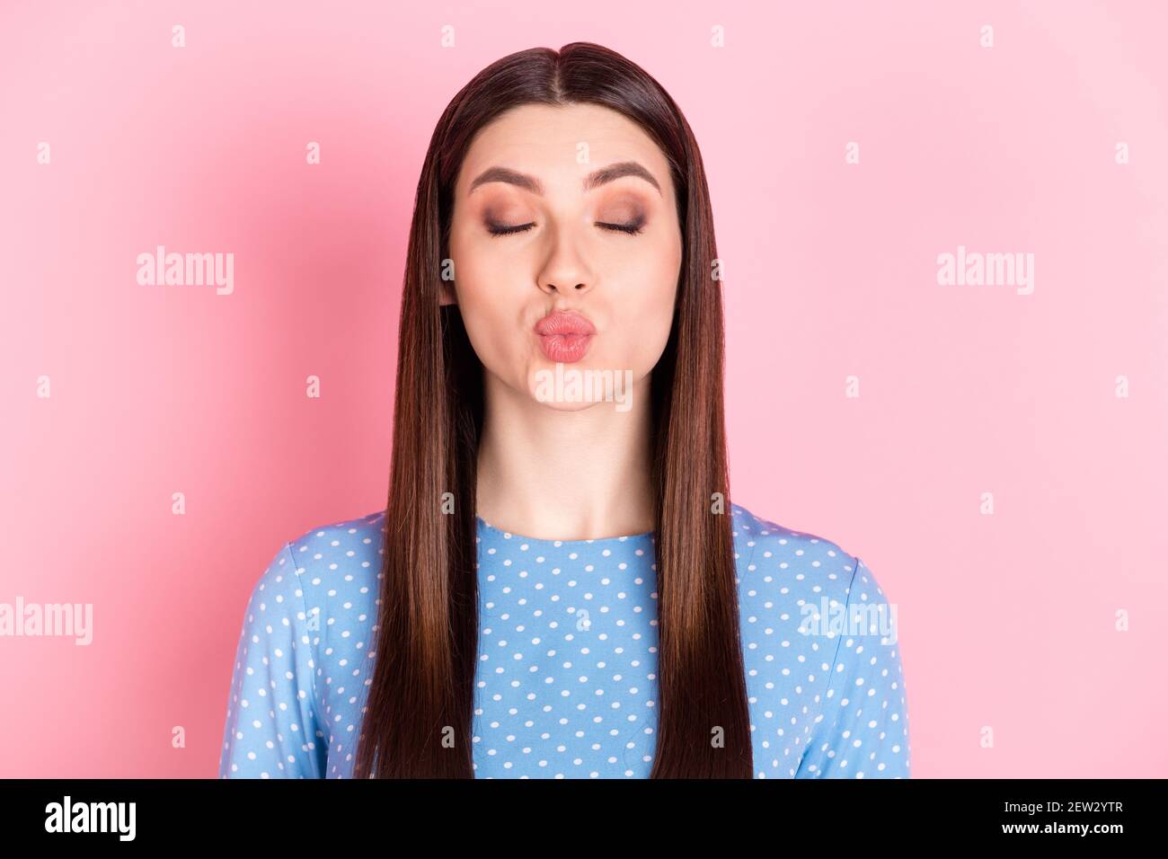 Photo of young beautiful charming lovely dreamy girl with closed eyes