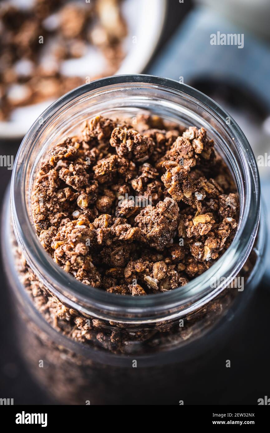 Chocolate breakfast cereal. Morning granola in jar Stock Photo Alamy