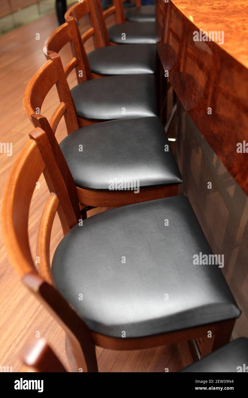 Old fashioned bar stools hi-res stock photography and images - Alamy