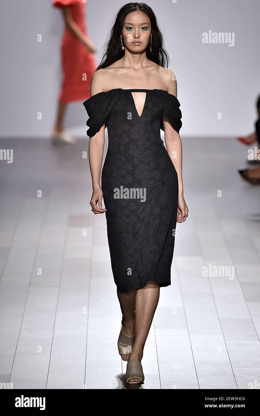 Model Yue Han walks on the runway during the Tadashi Shoji Fashion show ...