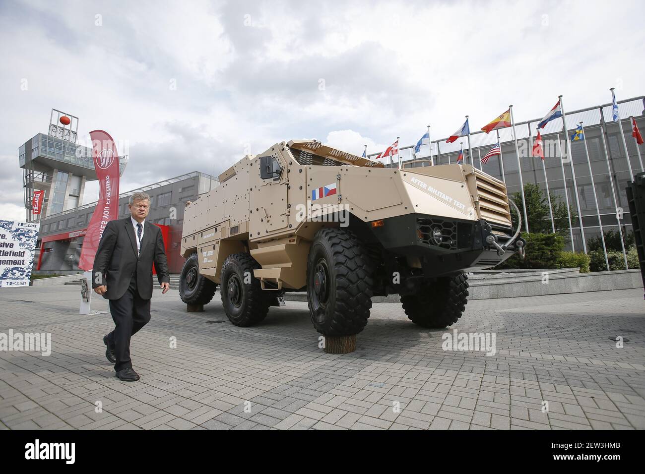 A visitor walks past a Titus Armoured Personnel Carrier (APC) during the 25th International Defence Industry Exhibition in Kielce, Poland on September 8, 2017. The Kielce exhibition is the largest of its kind in Central and Eastern Europe. (Photo by Jaap Arriens/Sipa USA) Stock Photo