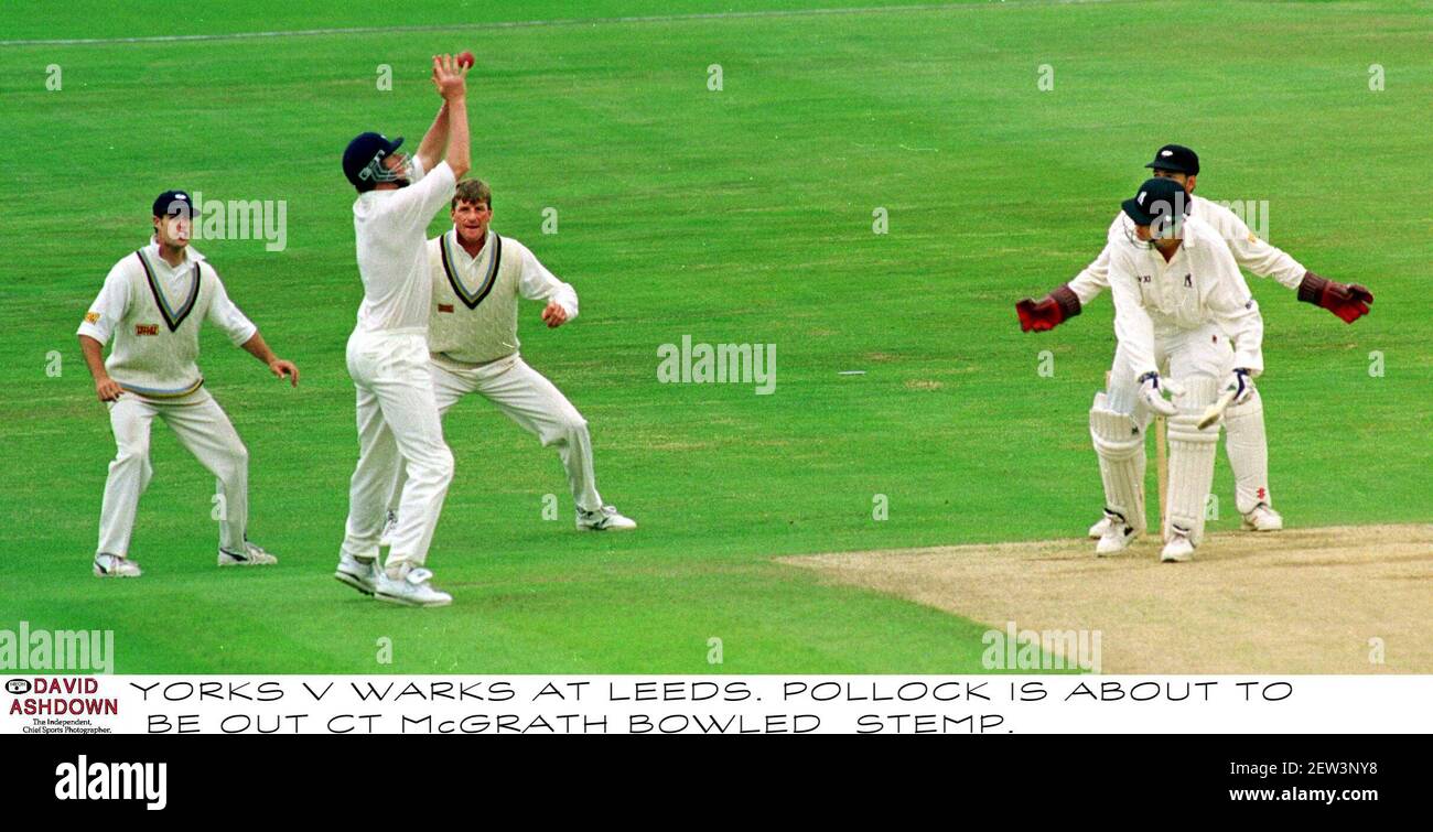 Warwickshire batsman Shaun Pollock is about to be caught by Yorkshires Anthony McGrath in the Britannic Assurance County Championship match at Leeds Stock Photo