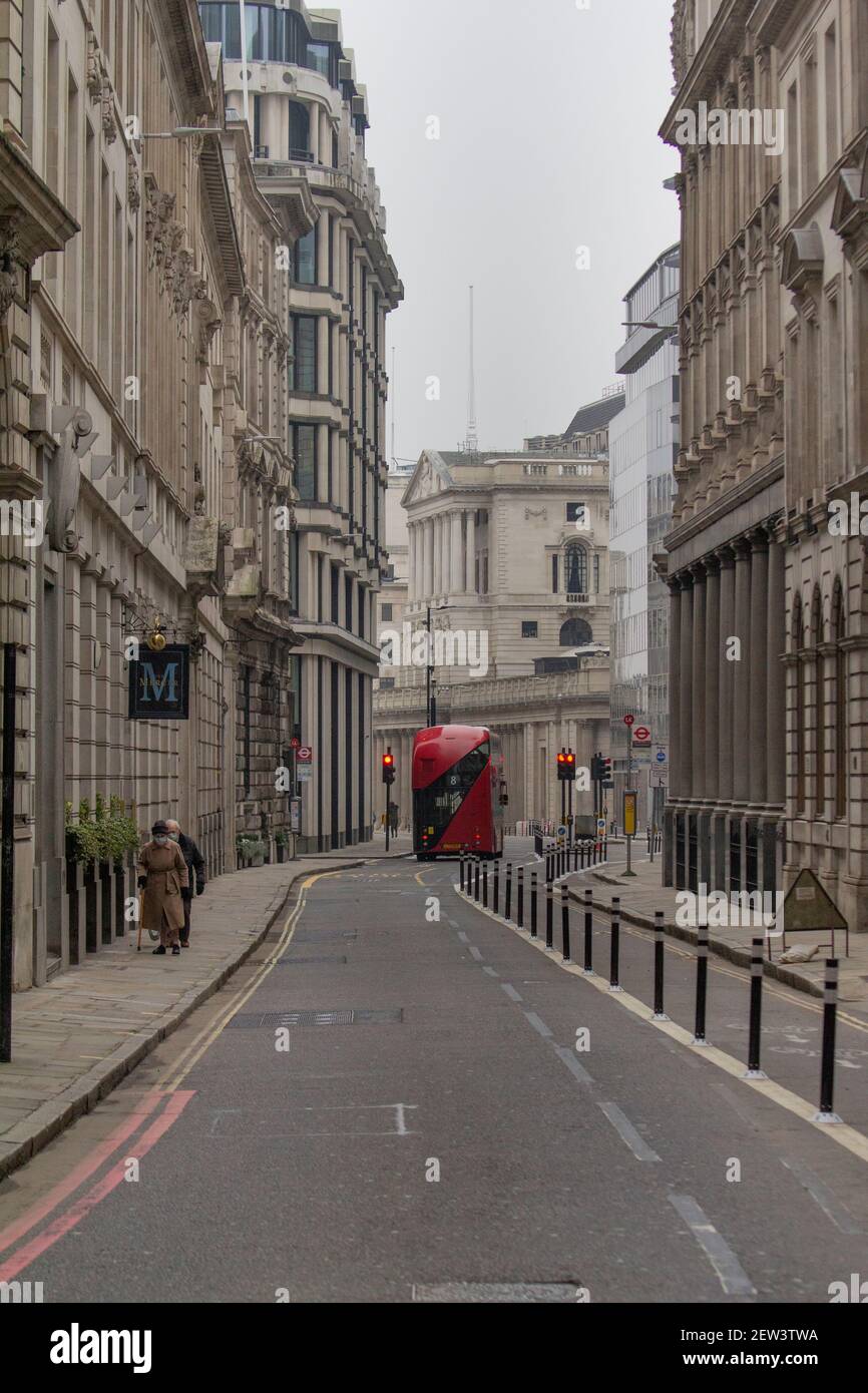 Empty streets during Coronavirus Covid-19 Pandemic Lockdown, City of London with Bank of England in centre background Stock Photo