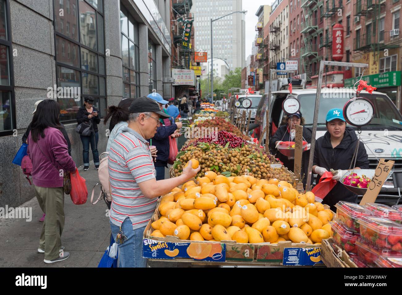 New York City, NY USA Fruit Stand selling , mangoes Longan fruit and