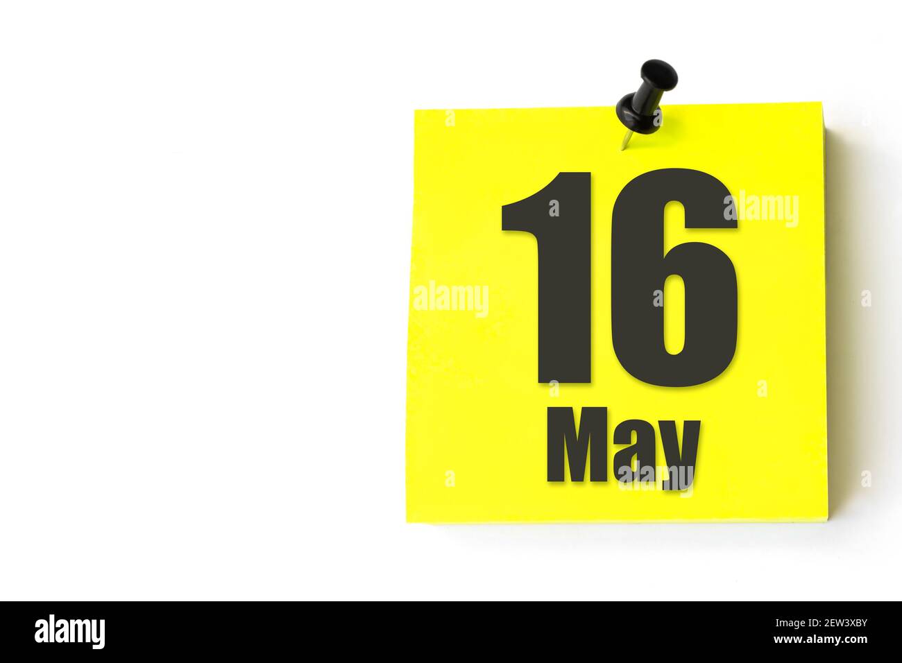 May 16th. Day 16 of month, Calendar date. Yellow sheet of the calendar