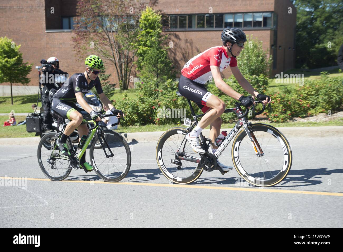 Canadian champion Matteo DalCin leads Benjamin Perry on a climb