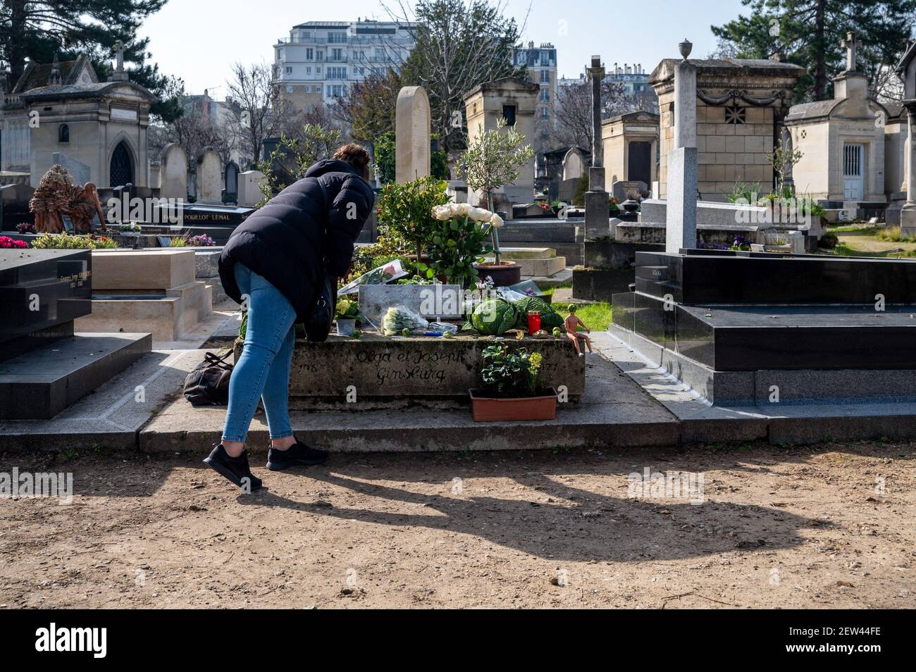 Fans gather next to the late singer and author Serge GanisbourgâÂ€Â™s grave, in Montparnasse cemetery in Paris, France, on March 2, 2021, on the very day that Gainsbourg passed away 30 years ago, on March 2, 1991. Photo by Ammar Abd Rabbo/ABACAPRESS.COM Stock Photo