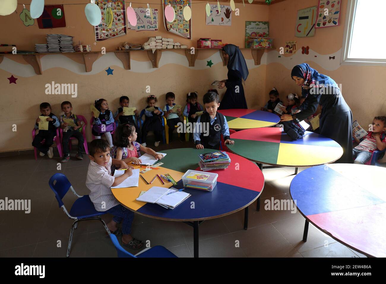 Palestinian children learn in the "Baraem Islamic" kindergarten in