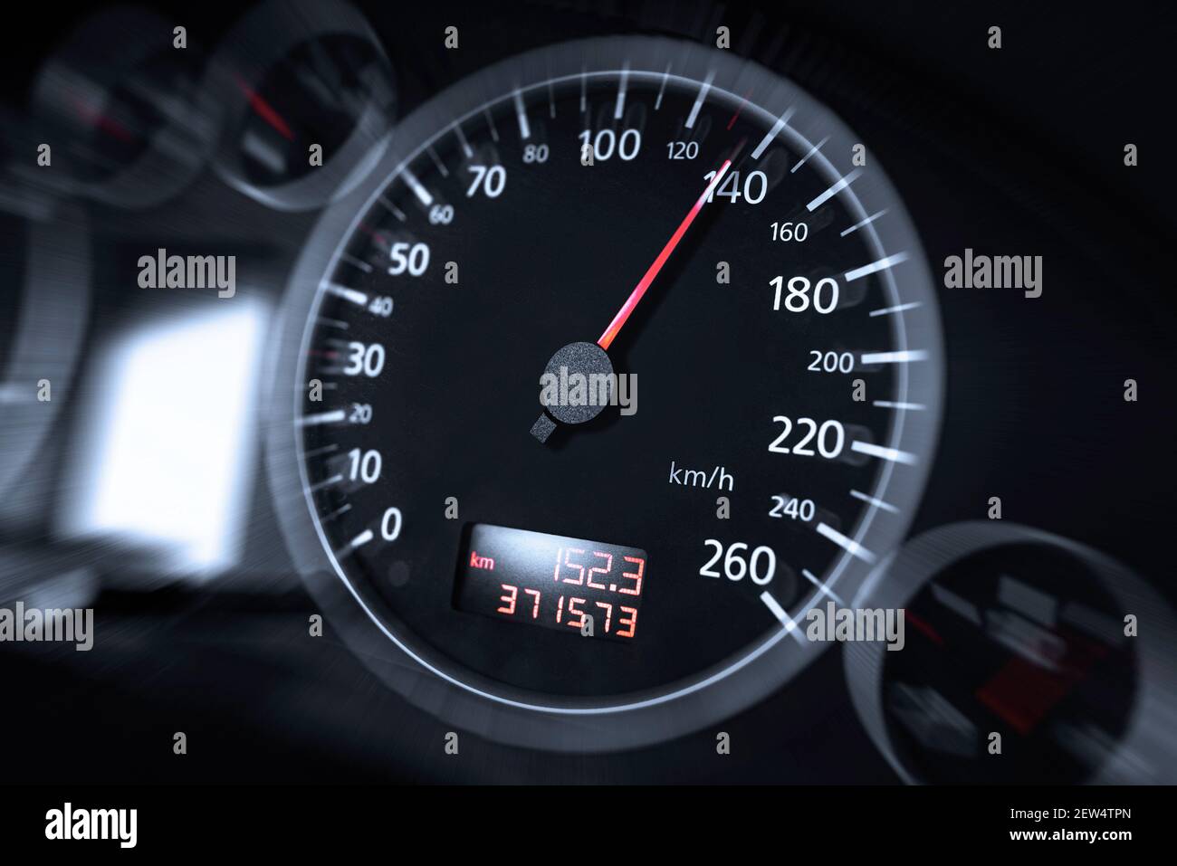 The speedometer of a modern car shows a high driving speed Stock Photo