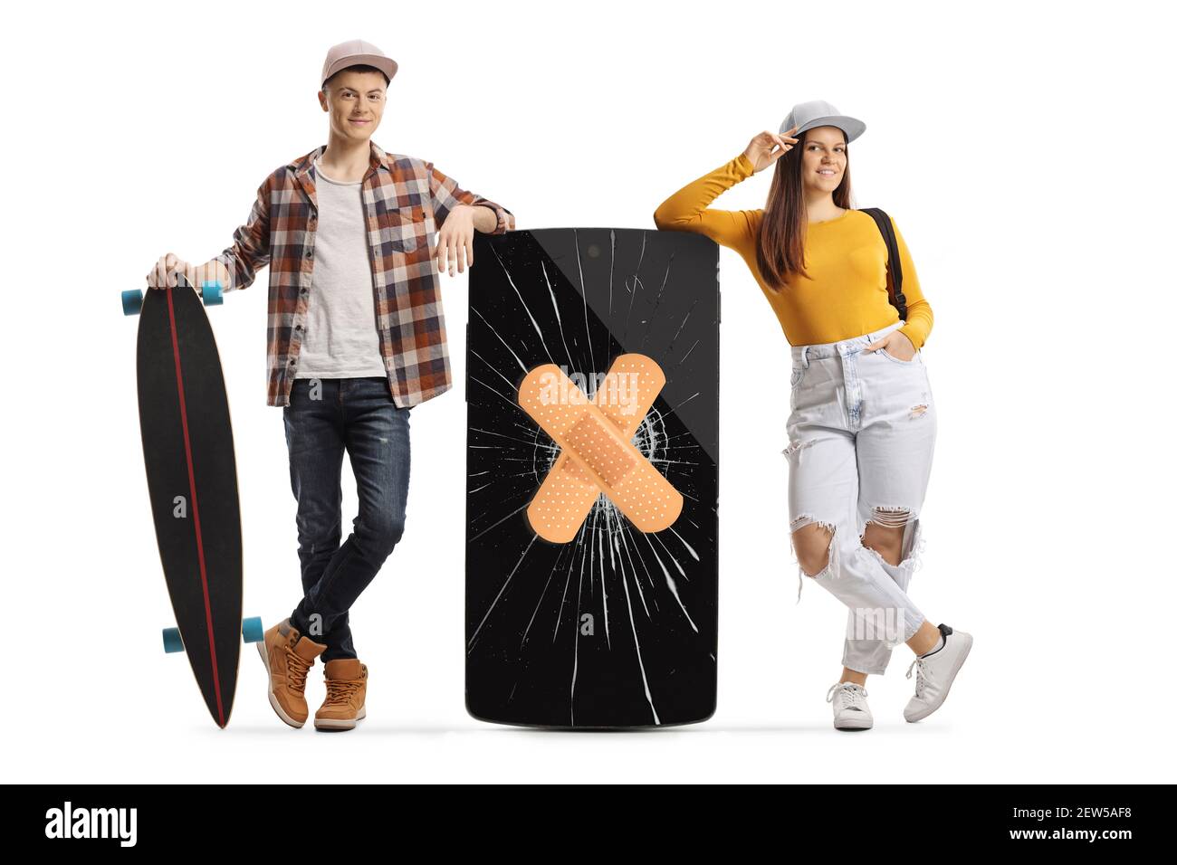Full length portrait of a guy with a skateboard and female student leaning on a mobile phone with cracked screen and bandage isolated on white backgro Stock Photo