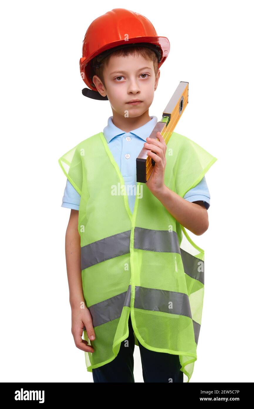 Child Boy With construction Level vest and helmet Isolated on white