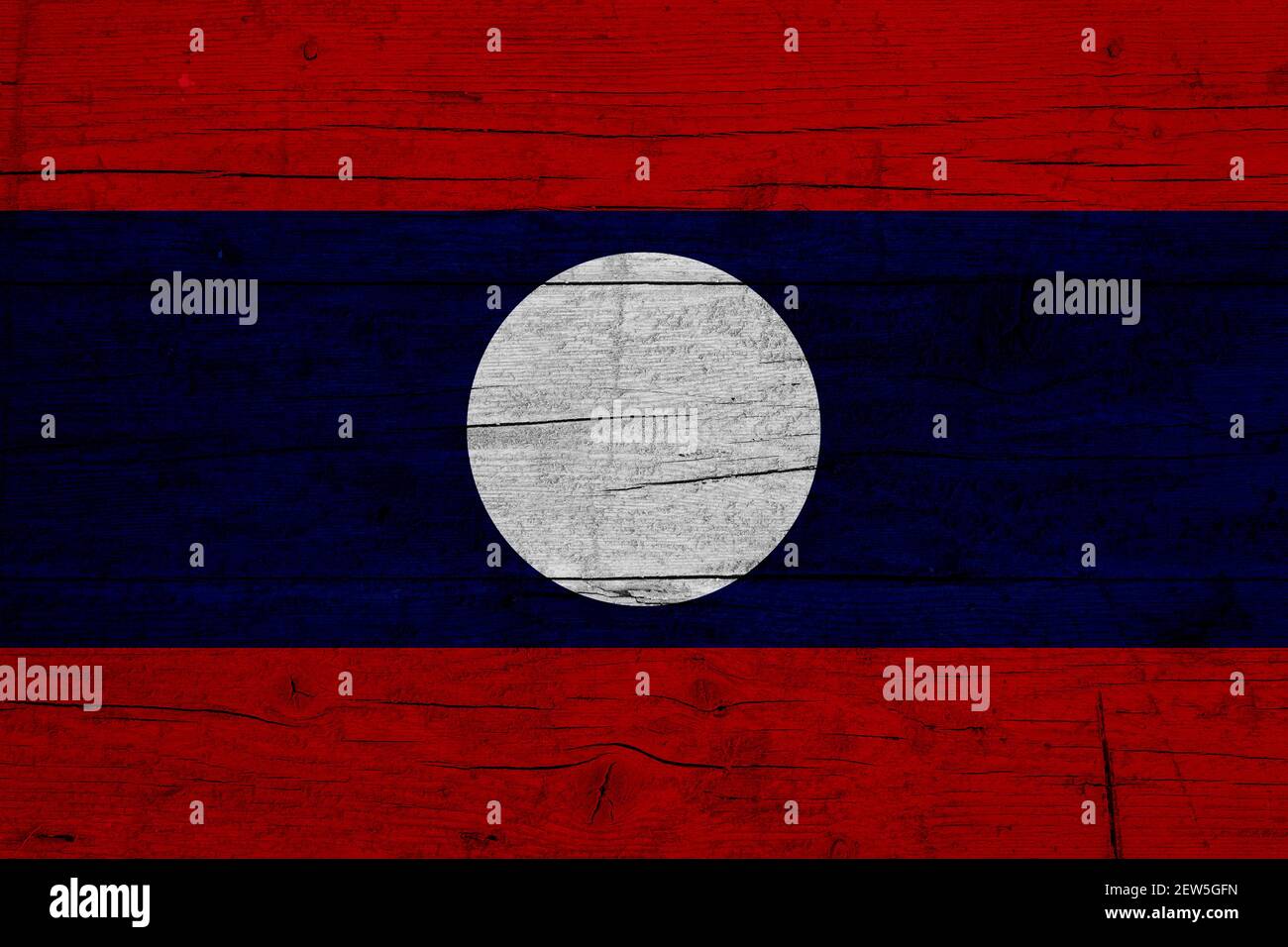 Flag of Laos Wooden texture of the flag of Laos. Stock Photo