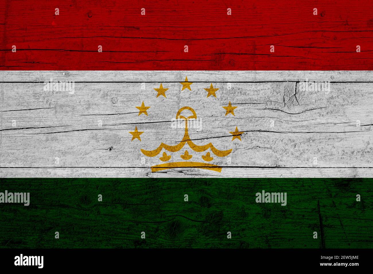 Flag of Tajikistan. Wooden texture of the flag of Tajikistan. Stock Photo