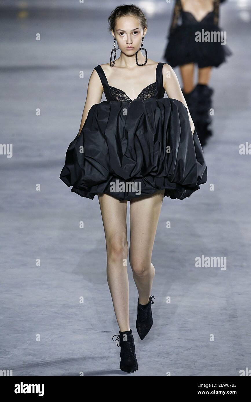 Model Michelle Gutknecht walks on the runway during the Saint Laurent ...