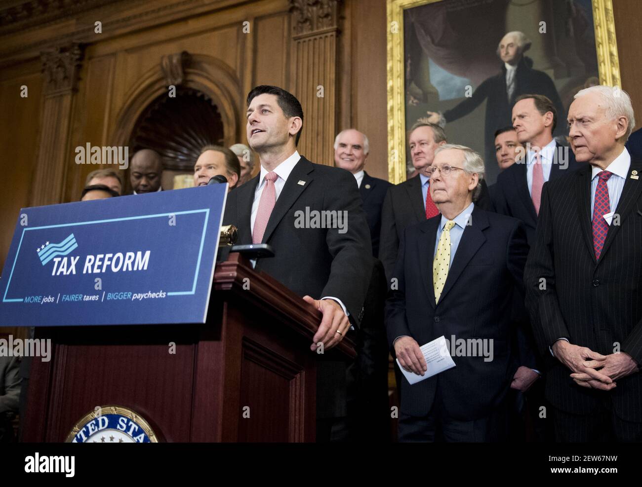 UNITED STATES - SEPTEMBER 27: Speaker of the House Paul Ryan, R-Wisc., left, Senate Majority Leader Mitch McConnell, R-Ky., and Sen. Orrin Hatch, R-Utah, participate in the Congressional GOP media availability to unveil the GOP tax reform plan in the Capitol on Wednesday, Sept. 27, 2017. (Photo By Bill Clark/CQ Roll Call) Stock Photo