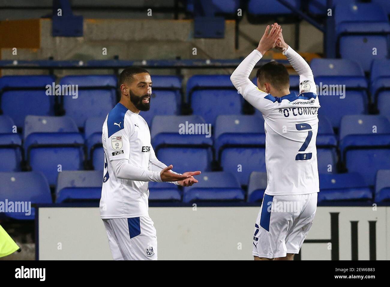 Birkenhead, UK. 02nd Mar, 2021. Liam Feeney of Tranmere Rovers (l) celebrates with his teammate Lee O'Connor after scoring his teams 1st goal. EFL Skybet Football league two match, Tranmere Rovers v Newport County at Prenton Park, Birkenhead, Wirral on Tuesday 2nd March 2021. this image may only be used for Editorial purposes. Editorial use only, license required for commercial use. No use in betting, games or a single club/league/player publications.pic by Chris Stading/Andrew Orchard sports photography/Alamy Live News Credit: Andrew Orchard sports photography/Alamy Live News Stock Photo