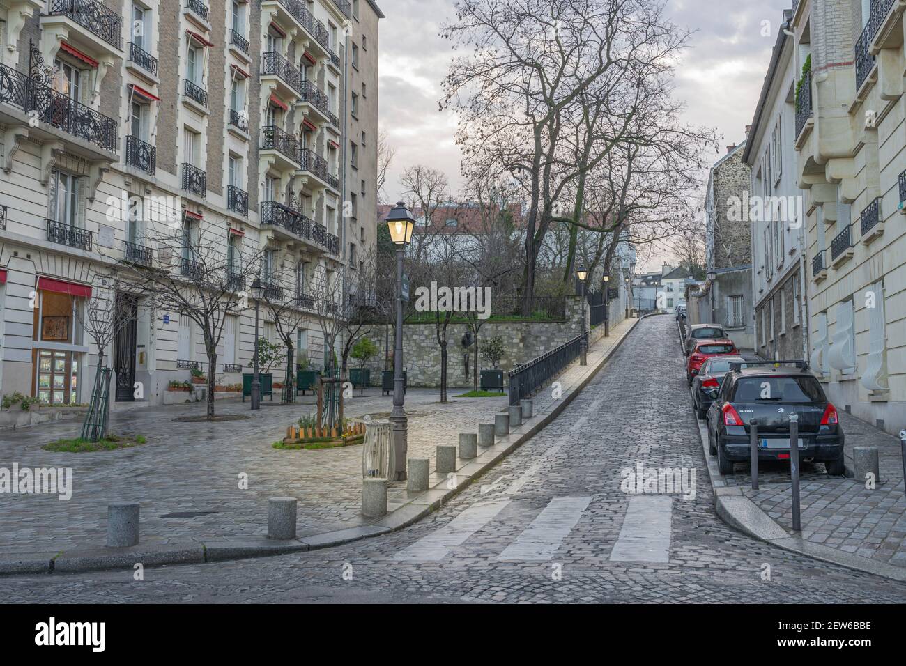 Paris, France - 02 26 2021: Montmartre district. Square Marcel Ayme and statue Le Passe-Muraille Stock Photo