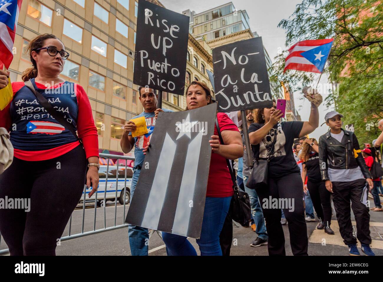 The Puerto Rican community in New York City expressing their outrage by ...