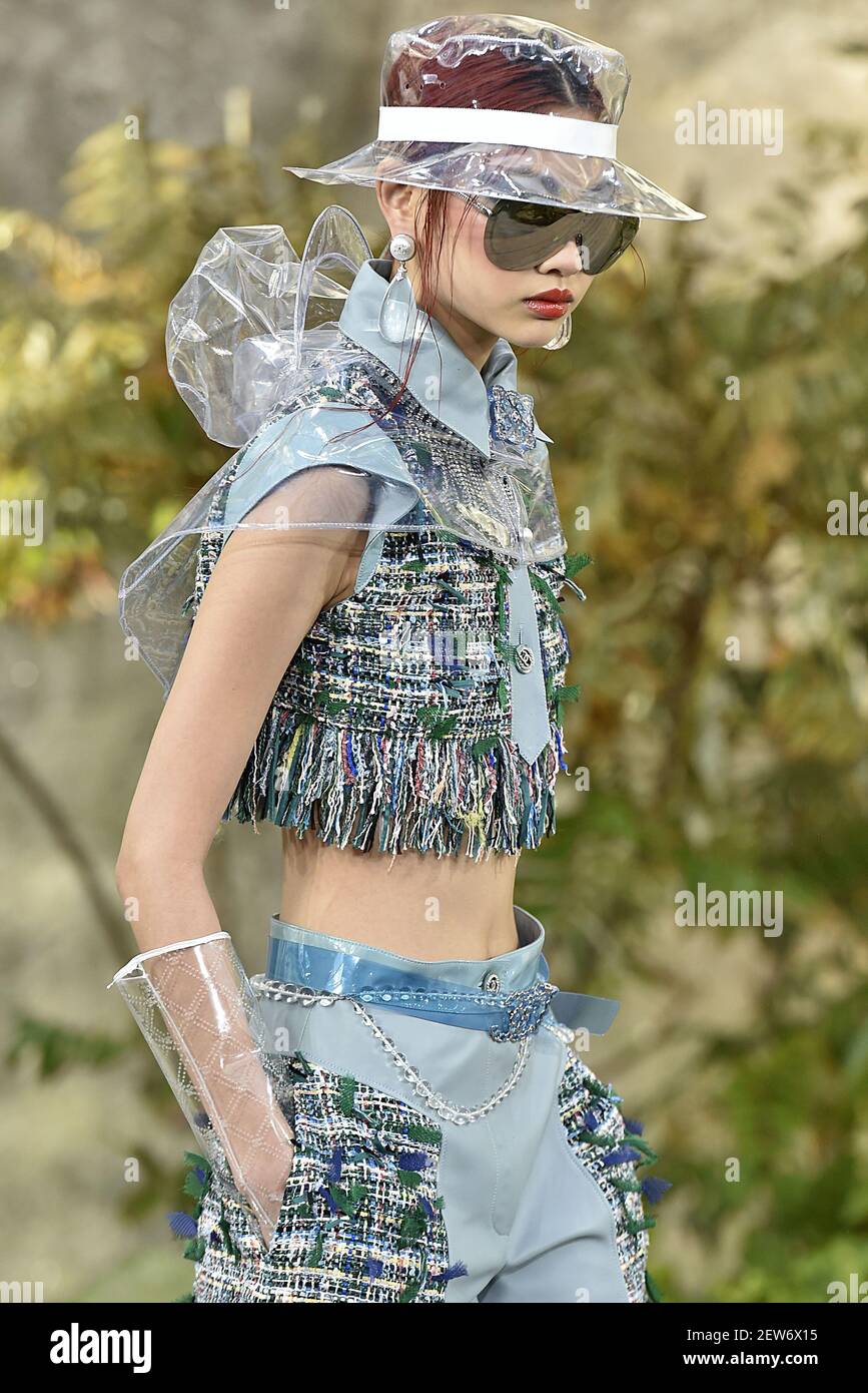 Model Hoyeon Jung walks on the runway during the Chanel Fashion