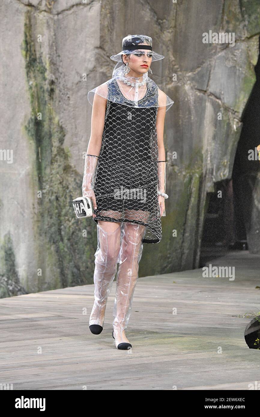 Model Saffron Vadher walks on the runway during the Chanel Fashion