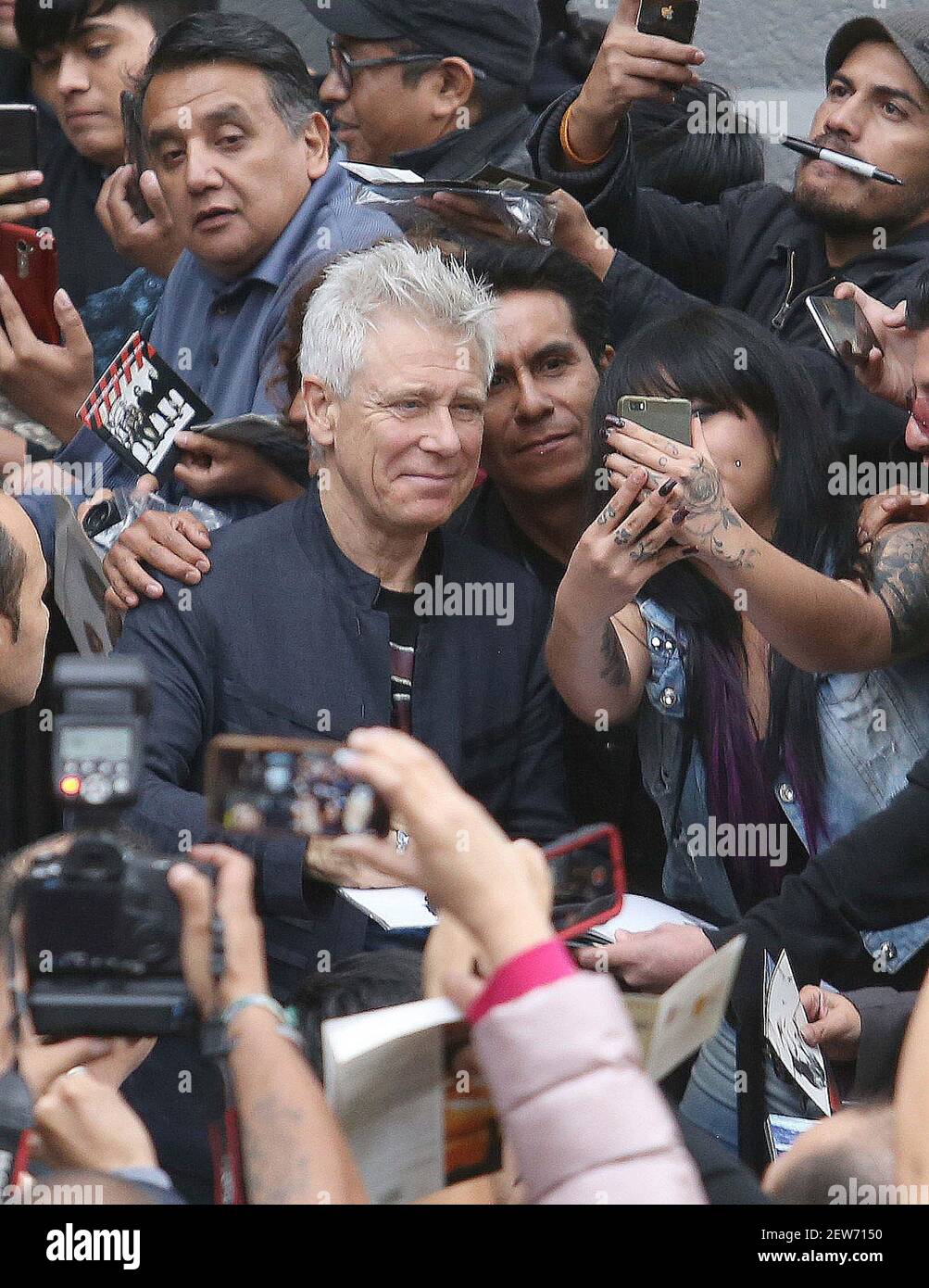Members Of The Band U2 Greeting And Signing For Their Fans Outside Their Hotel At The Four Seasons In Mexico City Mexico On October 4 2017 Stock Photo Alamy