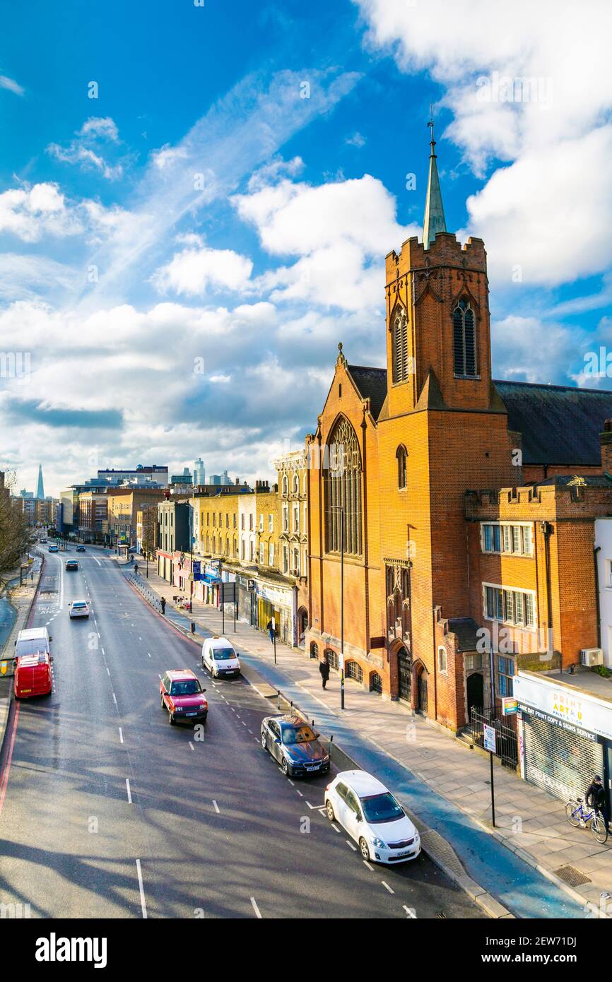 View of Mile End Road and the Guardian Angels Roman Catholic Church in Mile End, Tower Hamlets, London, UK Stock Photo