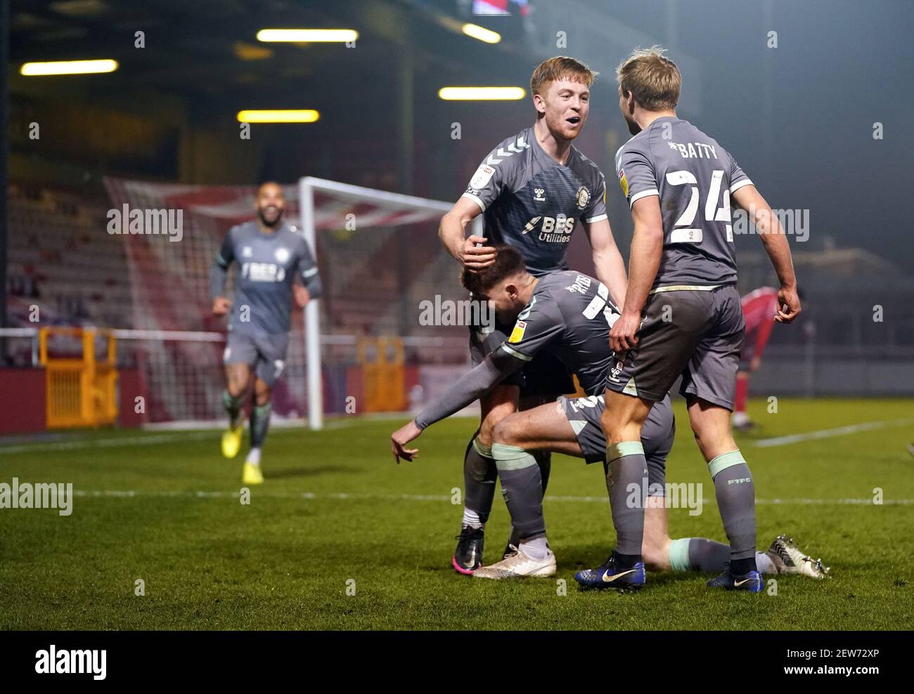 Fleetwood Town's Callum Camps celebrates with teammates after scoring his sides second goal during the Sky Bet League One match at the LNER Stadium, Lincoln. Picture date: Tuesday March 2, 2021. Stock Photo