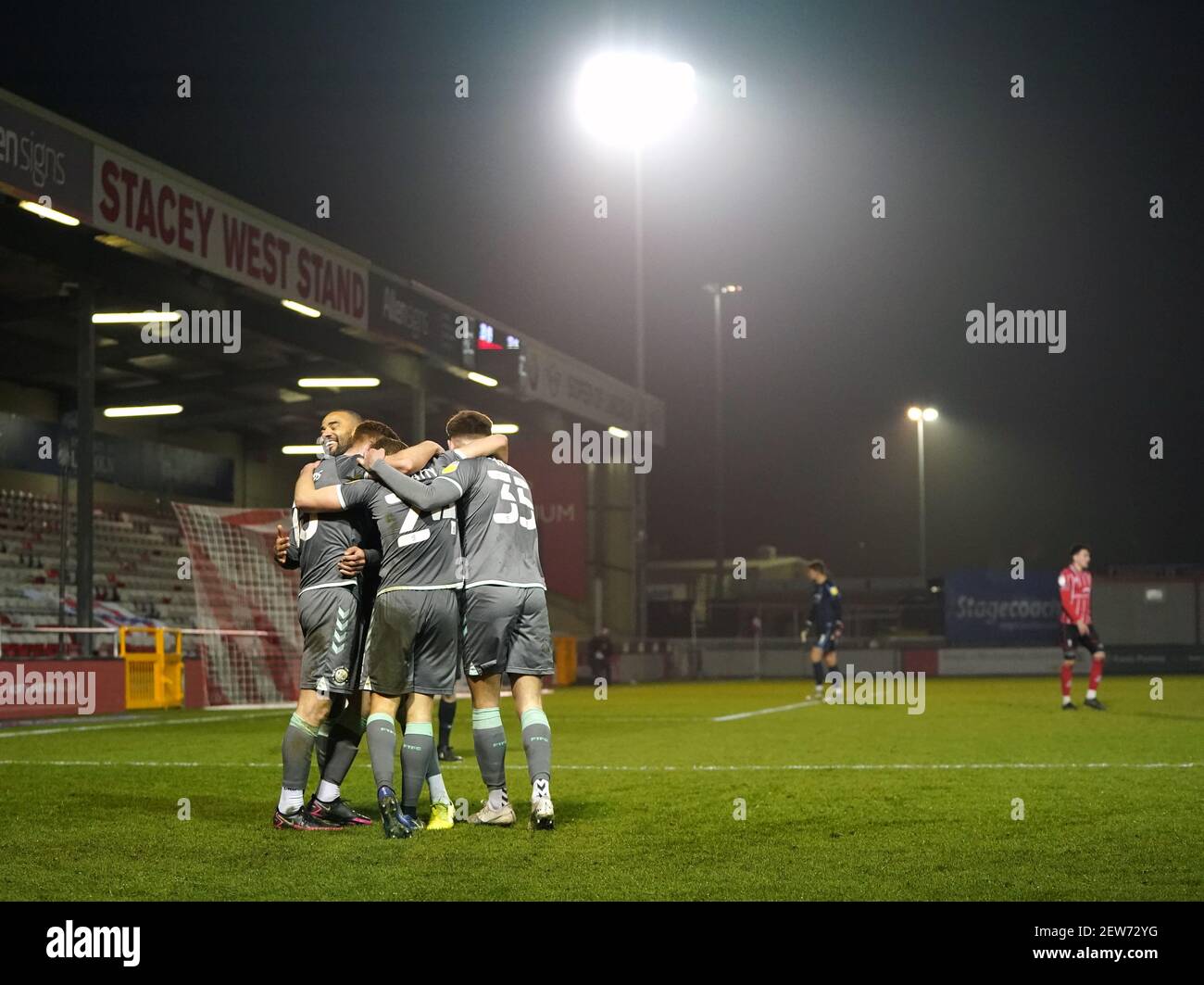 Fleetwood Town's Callum Camps celebrates with teammates after scoring his sides second goal during the Sky Bet League One match at the LNER Stadium, Lincoln. Picture date: Tuesday March 2, 2021. Stock Photo