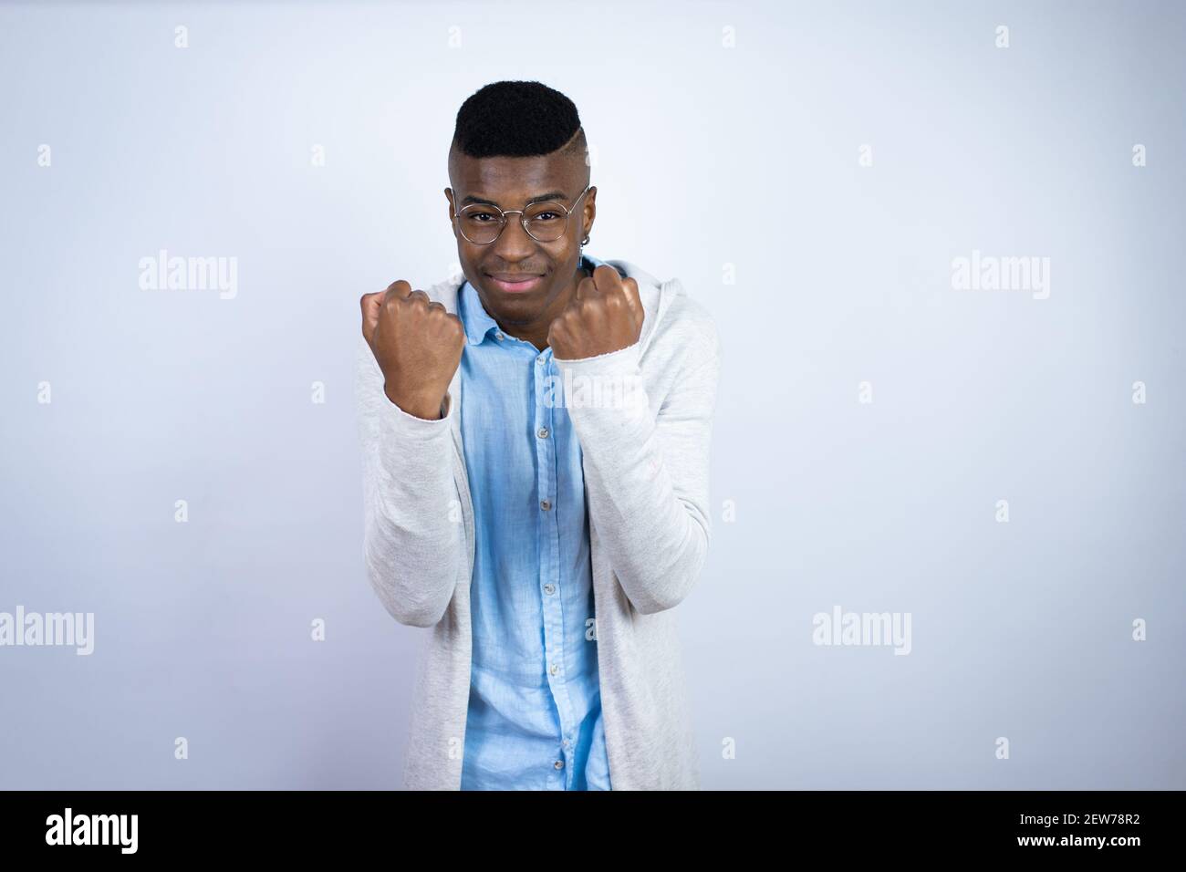 Young handsome african american man wearing casual clothes very happy ...