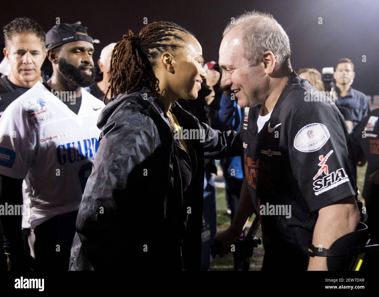 UNITED STATES - OCTOBER 11: Capitol Police officers David Bailey and Crystal Griner along with House Majority Whip Steve Scalise, R-La., participate in a halftime presentation during the Congressional Football Game at Gallaudet University in Washington on Wednesday, Oct. 11, 2017. The game featured the Capitol Police team The Guards vs the Congressional team The Mean Machine. (Photo By Bill Clark/CQ Roll Call) Stock Photo