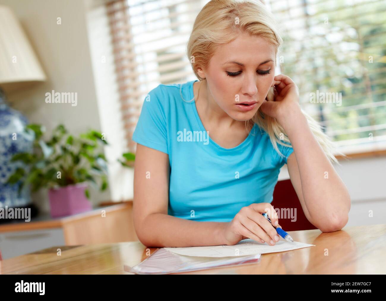 Woman writing letter Stock Photo