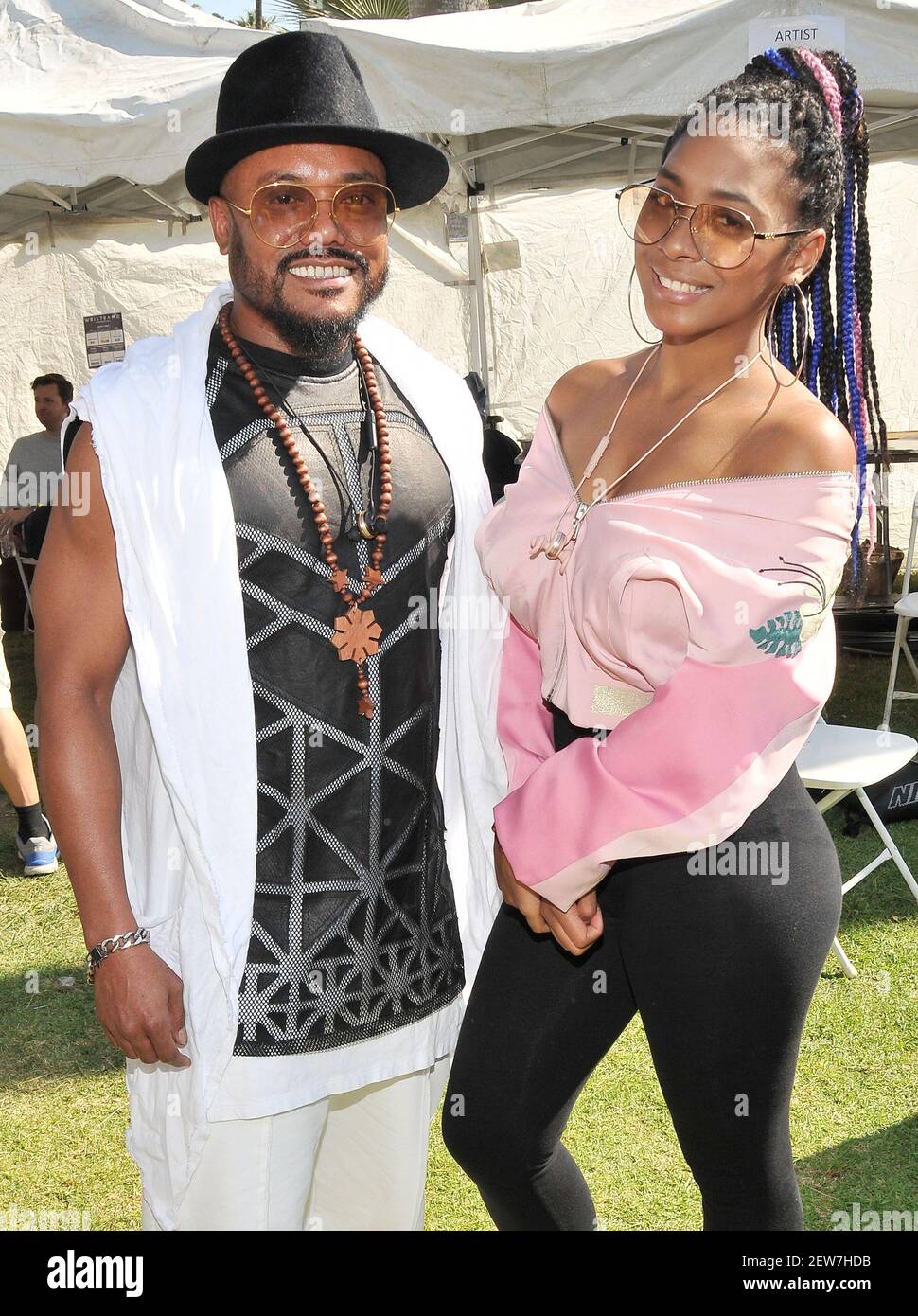 (LR) Apl.De.Ap of the Black Eyed Peas and Jessica Reynoso at the 26th